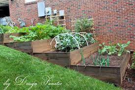 Tiered Raised Garden Beds Sloped Garden Building A Raised Garden Raised Garden Beds Diy