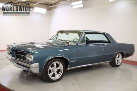 Image result for Singapore Gold 1964 GTO