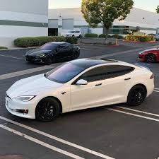 full black and white stormtrooper effect even white calipers rpmtesla tesla models tesla model s white tesla tesla car