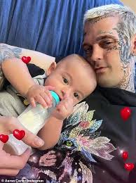 Aaron Carter's son, 3, makes red carpet debut as he looks just like his  famous dad who died 2 years ago