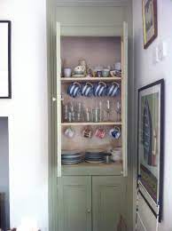 Close up image showing the period detailing of the cabinet. 11 Alcove Ideas House Interior Alcove Cupboards Alcove Storage
