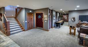 Dark or light colors will look great and you'll have little worry about the colors making the room feel small or confining. Covered Bridge Rustic Basement Omaha By Rezac Construction Houzz