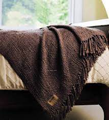 My cat's coloring is almost a perfect match for the blanket, and she often blends right in, so if you have grey or brown animals, make sure to look. Chocolate Brown European Loft Throw Blanket Brown Throw Blanket Throw Blanket Luxury Blanket