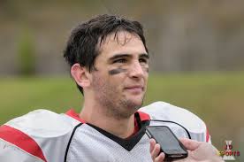 On a rare Saturday game, varsity football gets back to .500