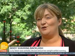 Woman who was fat shamed as she jogged fights back against man who abused  her