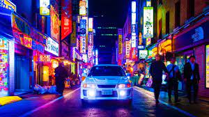 Jdm vehiclesdon'talways cost a hefty amount of money. Mitsubishi Lancer Evo V Japan City Neon Night Headlights Jdm Frontal View White Cars Wallpaper Resolution 2560x1440 Id 1165404 Wallha Com