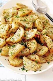 Italian Roasted Garlic Parmesan Potatoes Cinnamon Spice Everything Nice Recipe Potato Side Dishes Recipes Garlic Parmesan Potatoes