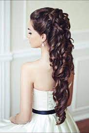 Give big, bouncy curls an upgrade by pinning one side of your hair up. Pin By Kenzie White On Wedding Wedding Hair Down Hair Styles Wedding Hairstyles