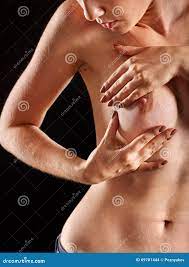 Nude Girl Sees Her Bare Breast. Stock Photo - Image of health, manual:  69701444