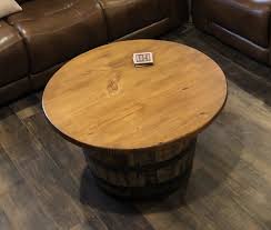 We love this whiskey barrel coffee table that's ideal for cabins or rooms with rustic/wood accents. Whiskey Barrel Coffee Table Baukol S Barrels