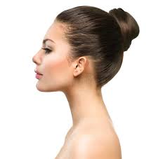 Side view of two young fashion models standing face to face. Beautiful Profile Face Of Young Woman With Clean Fresh Skin Sponsored Face Young Beautiful Profile Female Profile Side View Of Face Face Profile