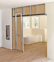 Porte coulissante intégrée dans cloison. Une Porte Coulissante Dans Une Cloison En Plaques De Platre Un Jeu D Enfant Architectura Be