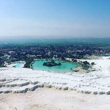 Deriving From Springs In A Cliff Almost 200 M High Overlooking The Plain Calcite Laden Waters Have Created At Pamukkale Cotton Palace An Unreal Landscape Ma