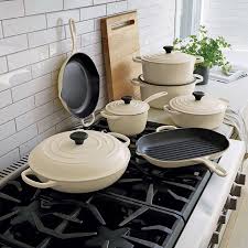 Le Creuset Signature 7 25 Qt Round Cream Dutch Oven With Lid Reviews Crate And Barrel In 2021 Le Creuset Cookware Kitchen Kitchen Must Haves