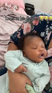 Baby Flipping Off Camera During Stocking Opening