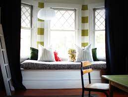 Main bedroom sitting area ideas by simply adding a chair, a sofa or even a bench to your bedroom, you can create a multifunctional space where you'll be happy to retreat at the end of a busy day. Window Seat And Stripes Between Bay Windows For The Boys Room Window Seat Design Bay Window Seat Bay Window Design