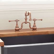 Here we have one of popular bridge kitchen faucets for you which is the vintage double handle kitchen faucet by kingston brass. Vintage Bridge Kitchen Faucet Antique Copper Farmhouse Kitchen Cincinnati By Signature Hardware Houzz