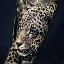 Leopard print tattoo on shoulder. Ash Higham Leopard Tattoo Big Cat Tattoo Leopard Tattoos Jaguar Tattoo