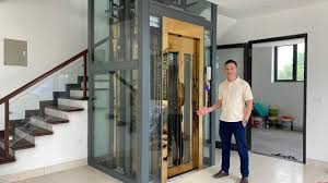 Thang máy gia đình 350kg khung thép vách kính sang trọng
