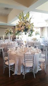 Silver Wooden Chiavari Chairs With White Cushions Floor Length Silver Bichon Satin Table Chiavari Chairs Wedding Silver Wedding Reception White Silver Wedding