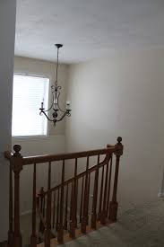 Cutting in the ceilings of a stairwell. Painting The Stairwell Plans Chris Loves Julia