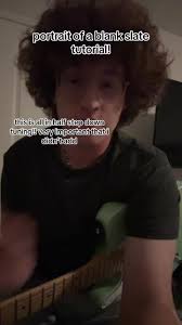 Wilbur Soot Tuning His Guitar