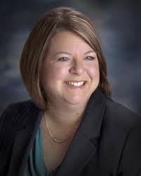 Munson creates positions to address health care reform