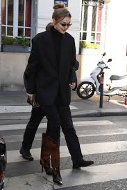 Gigi proudly wears good friend cara delevingne's face on her shirt, with the image of her kissing adwoa aboah. Street Style Gigi Hadid Out And About In Paris Justfabzz