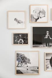 Black And White Photo Frames For Wall Black And White Photos In Light Wood Frames Gallery Wall Frames Master Bedroom Nursery Nursery Nook