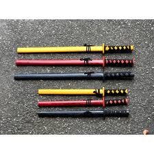 Melayani pembelian&pemesanan pedang samurai/katana, dan berbagai macam senjata. Pedang Samurai Kayu Ready Stok