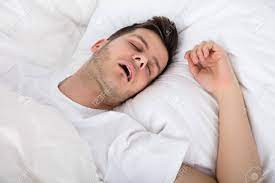 Affordable and search from millions of royalty free images, photos and vectors. View Of Tired Young Man Snoring While Deep Sleeping In Bed Stock Photo Picture And Royalty Free Image Image 88245001
