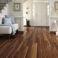 The Low Down On Laminate Vs Hardwood Floors Walnut Laminate Flooring Flooring Wood Laminate Flooring