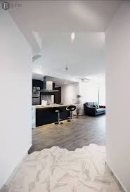 When Marble Meets Wood We Love The Contrast In This Condo S Flooring Floor Tiles Topiary Interior Design Singapore Condominium Entrance Condominium