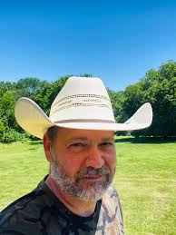 Ribeye turned out perfect using my Dad's-Day gift (Press)… and wearing my  new Dad's Day hat). Coat ribeye in Olive oil at room temp…. Add favorite  steak seasoning