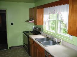 Def repainting the cabinets, and updating the hardware would make your kitchen look more up to date. New Kitchen For 1960 S Ranch House Fine Homebuilding