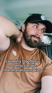 Laughing Together: A Joyful Moment in the Car