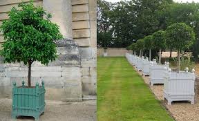 Item 2 self watering versailles 26 in. Design Sleuth A Planter With Pedigree Gardenista