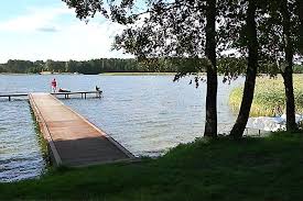 Powierzchnia jeziora wynosi 1 363,8 ha. Domki Letniskowe Jezioro Slone Noclegi Domferie