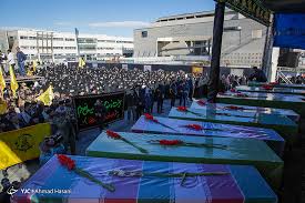 Image result for ‫پیکر مطهر ۱۱ شهید دفاع مقدس و مدافع حرم تشییع شد‬‎