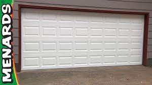 Lower the door to make sure there are no pipes or framing members in the way. Garage Door How To Install Menards Youtube