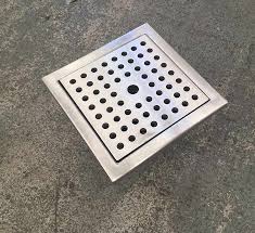 You can have standard floor level outlets in a bathroom so long as they are in addition to the required vanity outlet. Square Top Side Outlet Drain Gullies Kent Stainless
