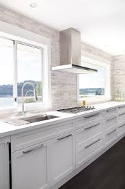 Open shelves provide ready access to items used every day. No Upper Cabinets Contemporary Kitchen Moeski Design Agency