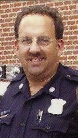 Ex-cop charged with lewdness at school