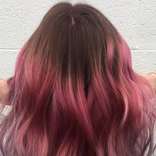 This pastel pink has actually been diligently streaked through the black hair to develop an attractive ombre balayage. The Key To Perfect Pink Hair Color Don T Bleach The Roots Allure