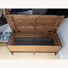 48wx18dx18h solid acacia wood with brown stain plastic levelers safety hinges clean with soft cloth made in india. Crate Barrel Teca Storage Trunk Bench Aptdeco