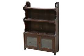 This 'cabinet of curiosities' will permit you to display as in a museum your own special treasures. Lot 382 A Late Victorian Mahogany Wall Mounted