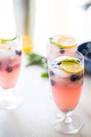 I love pitcher cocktails for summer dinner parties! Blueberry Vodka Lemonade Lemonsforlulu Com