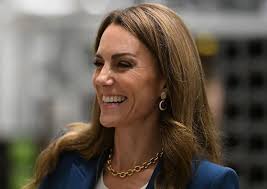 The Princess of Wales styles her classic suit with a chunky gold chain  necklace