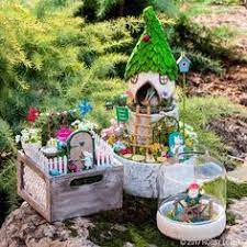 Look in the toy section at dollar tree for the small dollhouse furniture pieces they have. 54 Fairy Gardens Ideas Fairy Garden Fairy Miniature Garden