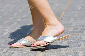 Pretty feet in soft white bedroom slippers toeslagen berekenen. Female Feet And Slippers Stock Photo Picture And Royalty Free Image Image 19894638